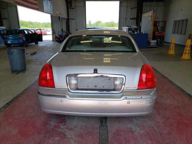 Photo 6 from auction – 2004 LINCOLN TOWN CAR U with VIN 1LNHM83W64Y677420
