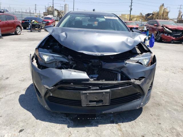 Photo 5 from auction – 2017 TOYOTA COROLLA L with VIN 5YFBURHE7HP571438