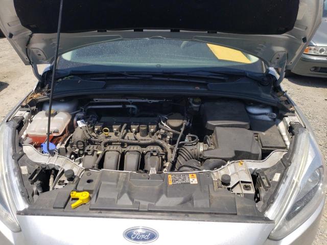 Photo 11 from auction – 2015 FORD FOCUS TITA with VIN 1FADP3J22FL386304