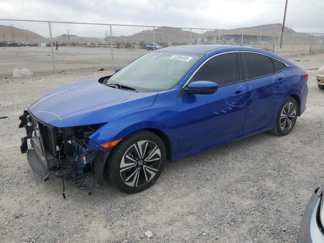 HONDA CIVIC EXL 2018 with VIN JHMFC1F76JX004797 - Photo from auction
