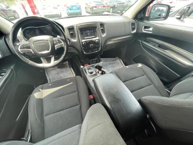 Photo 9 from auction – 2014 DODGE DURANGO SX with VIN 1C4RDJAG7EC595478