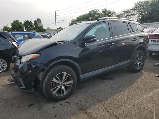 TOYOTA RAV4 XLE 2017 with VIN 2T3RFREV8HW566123 - Photo from auction
