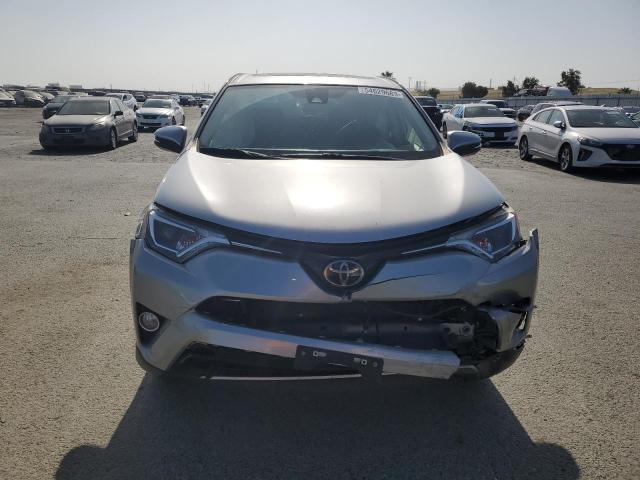 Photo 5 from auction – 2018 TOYOTA RAV4 with VIN JTMWFREV0JJ166905