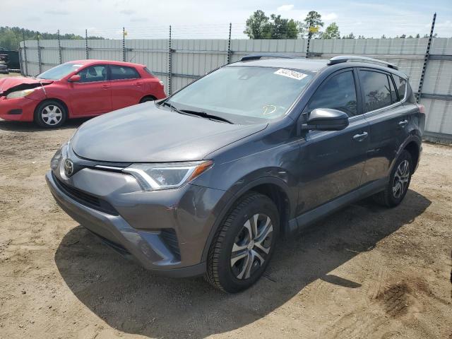TOYOTA RAV4 LE 2018 with VIN 2T3ZFREV0JW429053 - Photo from auction