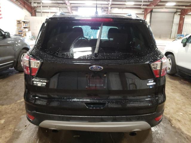 Photo 6 from auction – 2017 FORD ESCAPE SE with VIN 1FMCU9GD0HUC37957