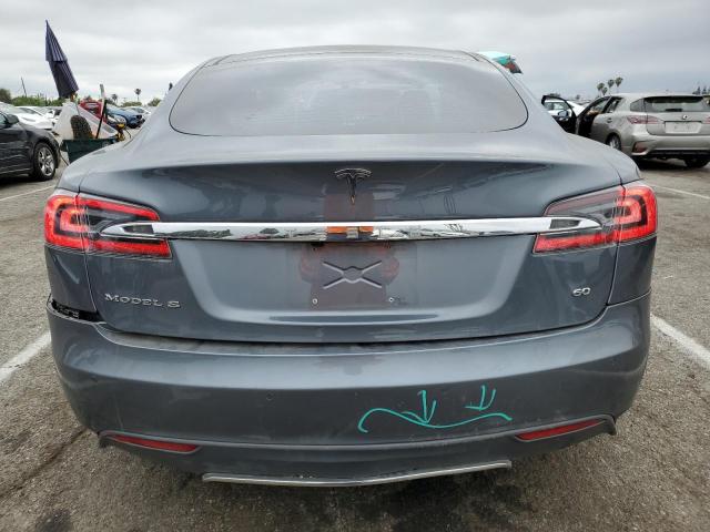 Photo 6 from auction – 2014 TESLA MODEL S with VIN 5YJSA1S14EFP33176