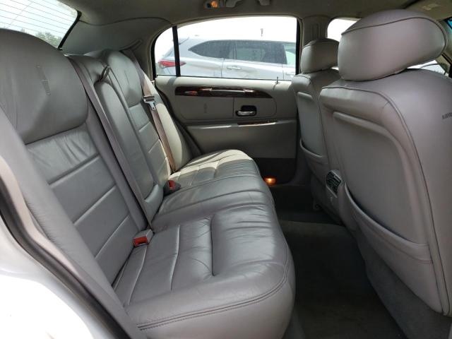 Photo 10 from auction – 2002 LINCOLN TOWN CAR with VIN 1LNHM82W12Y655100