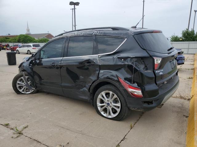 Photo 2 from auction – 2017 FORD ESCAPE SE with VIN 1FMCU9GD6HUD11690