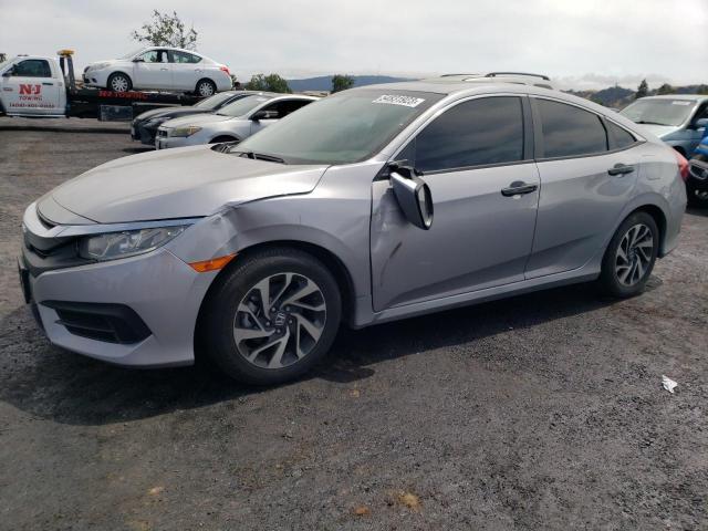HONDA CIVIC EX 2018 with VIN 2HGFC2F76JH525175 - Photo from auction