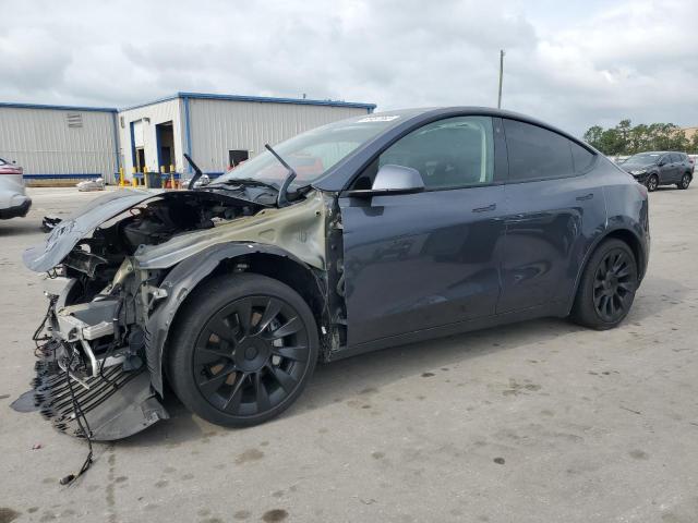 TESLA MODEL Y 2021 with VIN 5YJYGDED3MF103695 - Photo from auction