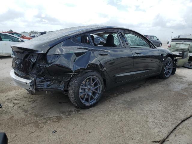 Photo 3 from auction – 2021 TESLA MODEL 3 with VIN 5YJ3E1EA7MF091068