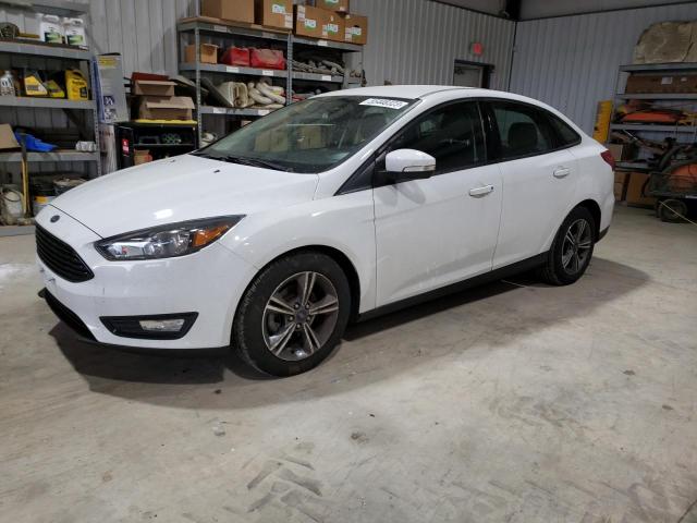 FORD FOCUS SE 2017 with VIN 1FADP3FE4HL292446 - Photo from auction