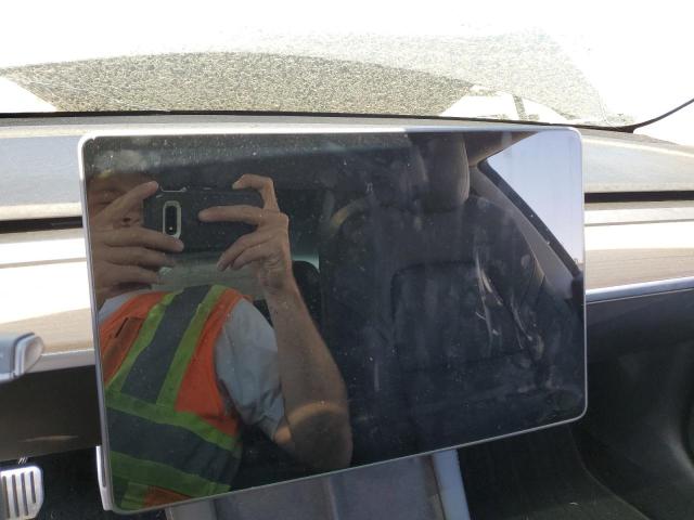 Photo 9 from auction – 2021 TESLA MODEL 3 with VIN 5YJ3E1EB2MF876736