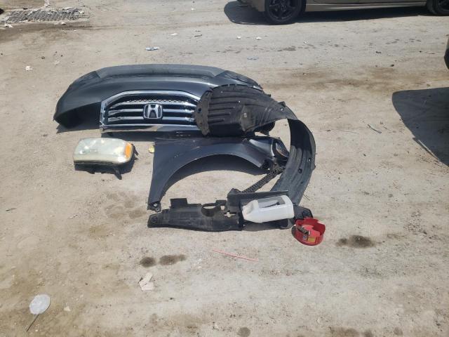 Photo 13 from auction – 2012 HONDA PILOT LX with VIN 5FNYF3H20CB009747