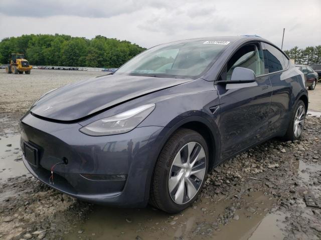 TESLA MODEL Y 2023 with VIN 7SAYGAEE5PF630233 - Photo from auction