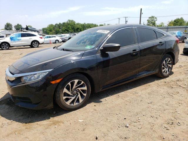 HONDA CIVIC EX 2018 with VIN 2HGFC2F79JH528099 - Photo from auction