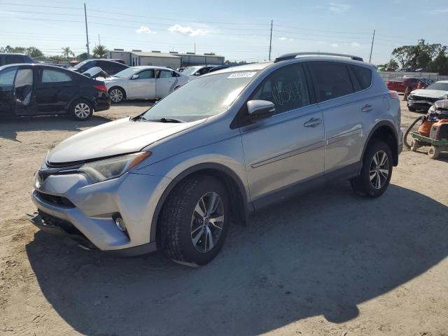 Photo 1 from auction – 2017 TOYOTA RAV4 XLE with VIN 2T3WFREV8HW393657