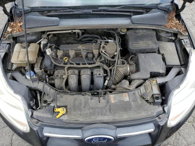 Photo 11 from auction – 2014 FORD FOCUS with VIN 1FADP3F20EL453540