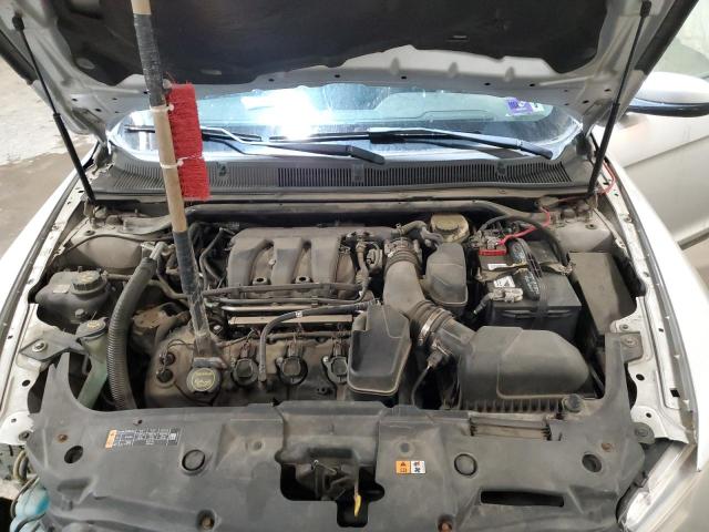 Photo 11 from auction – 2013 FORD TAURUS SEL with VIN 1FAHP2E84DG209804