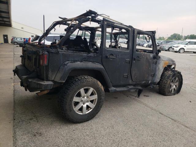 Photo 3 from auction – 2011 JEEP WRANGLER U with VIN 1J4BA5H15BL625554