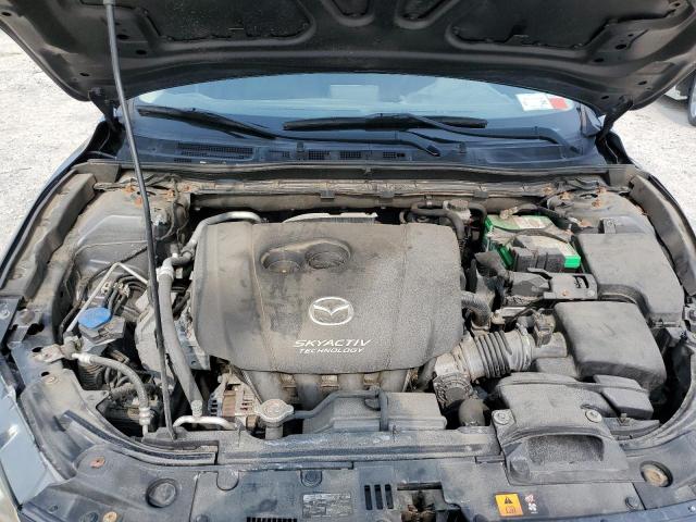 Photo 11 from auction – 2014 MAZDA 3 SV with VIN JM1BM1T75E1157410