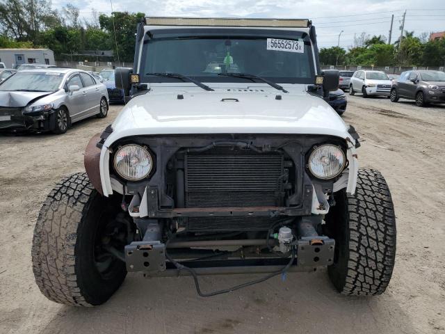 Photo 5 from auction – 2016 JEEP WRANGLER U with VIN 1C4BJWDG5GL279020