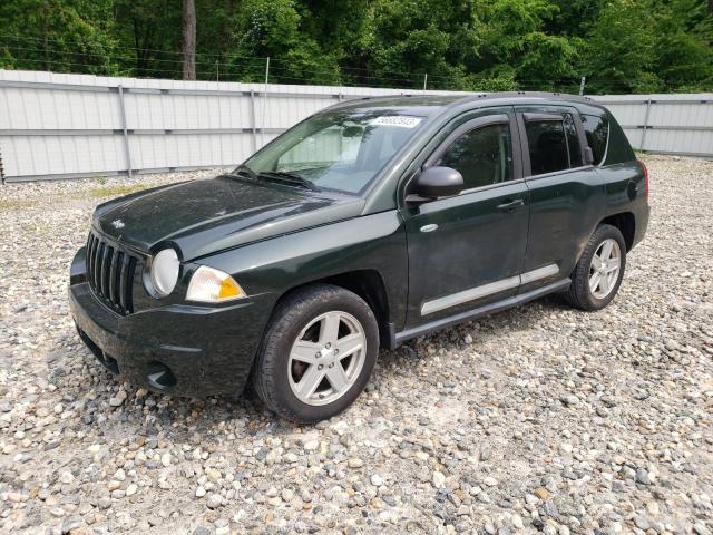 JEEP COMPASS SP 2010 with VIN 1J4NF1FB3AD623667 - Photo from auction