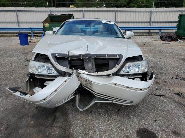 Photo 5 from auction – 2004 LINCOLN TOWN CAR E with VIN 1LNHM81W94Y660498