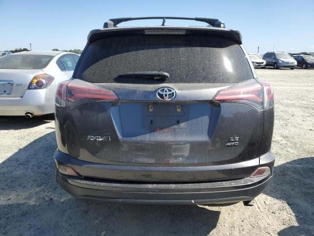 Photo 6 from auction – 2018 TOYOTA RAV4 LE with VIN JTMBFREV9JJ732445