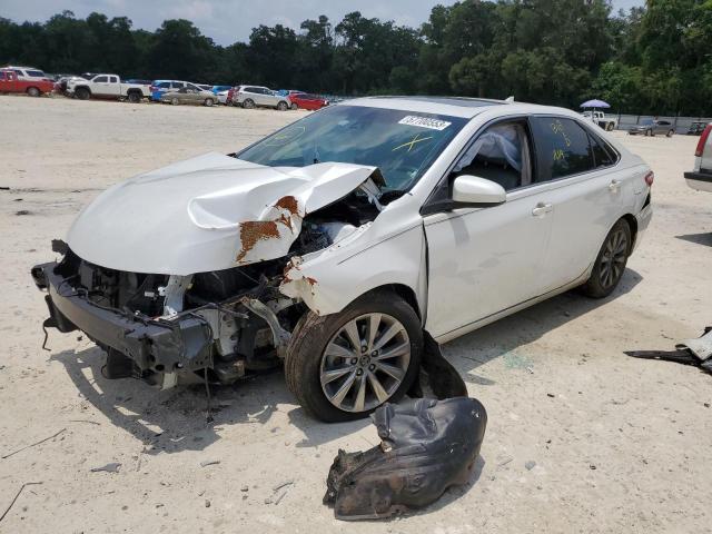 TOYOTA CAMRY LE 2017 with VIN 4T1BF1FK4HU642212 - Photo from auction