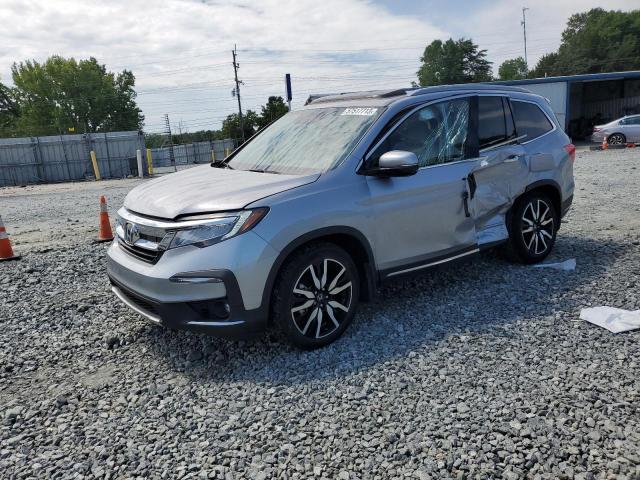HONDA PILOT TOUR 2021 with VIN 5FNYF5H67MB014606 - Photo from auction