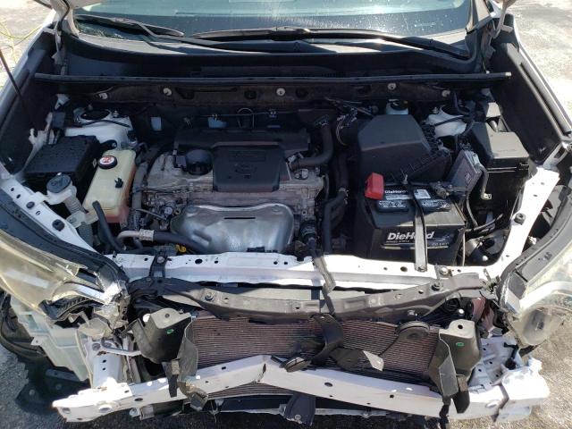 Photo 12 from auction – 2018 TOYOTA RAV4 LE with VIN JTMZFREV2JJ164540