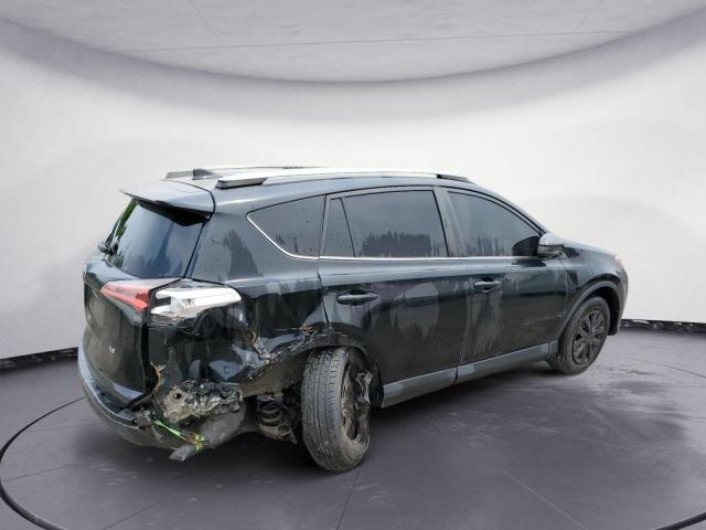 Photo 3 from auction – 2018 TOYOTA RAV4 LE with VIN 2T3ZFREV3JW522035