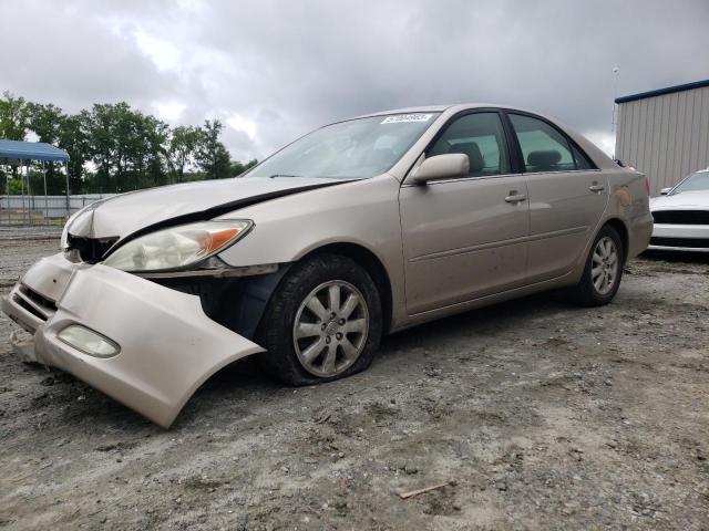 TOYOTA CAMRY LE 2003 with VIN 4T1BF30KX3U547649 - Photo from auction