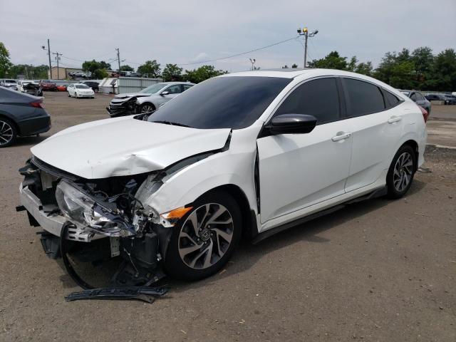 HONDA CIVIC EX 2018 with VIN 2HGFC2F74JH562077 - Photo from auction