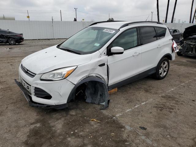 FORD ESCAPE SE 2016 with VIN 1FMCU9GXXGUB64797 - Photo from auction