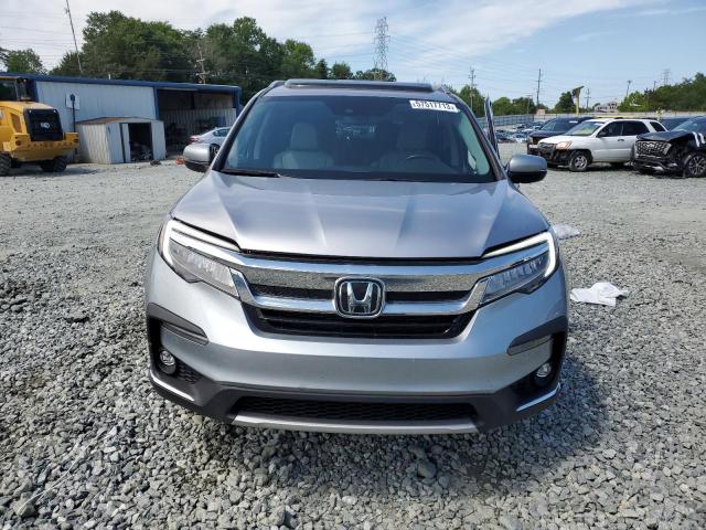 Photo 5 from auction – 2021 HONDA PILOT TOUR with VIN 5FNYF5H67MB014606