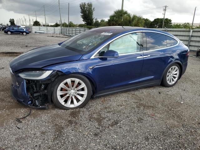 TESLA MODEL X 2018 with VIN 5YJXCDE25JF089932 - Photo from auction