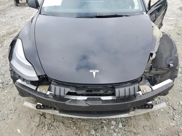 Photo 11 from auction – 2022 TESLA MODEL 3 with VIN 5YJ3E1EB2NF286554