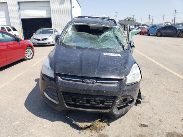 Photo 5 from auction – 2016 FORD ESCAPE SE with VIN 1FMCU9G99GUB98456