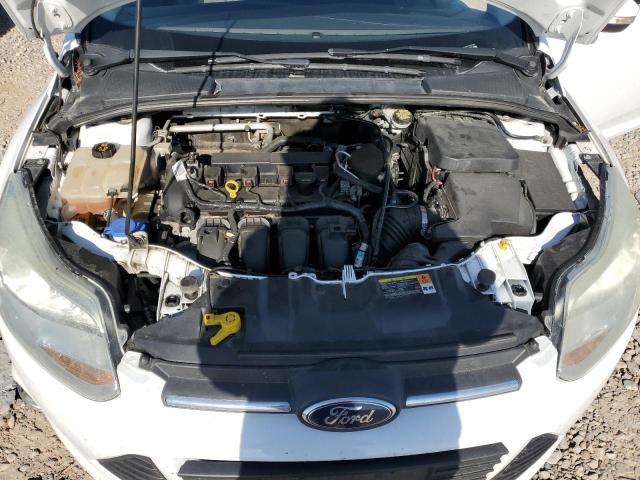 Photo 11 from auction – 2014 FORD FOCUS SE with VIN 1FADP3F23EL197572