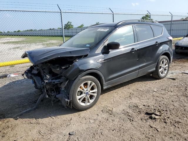FORD ESCAPE SE 2018 with VIN 1FMCU0GD5JUC90364 - Photo from auction