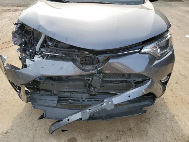 Photo 12 from auction – 2018 TOYOTA RAV4 with VIN JTMRFREV5JD249015