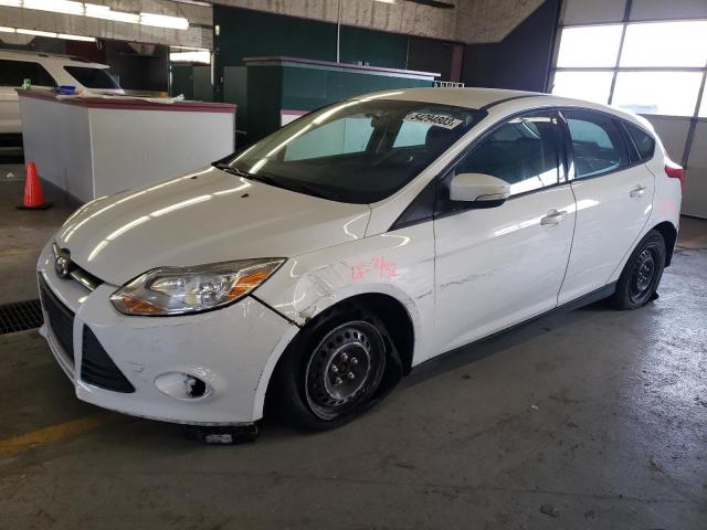FORD FOCUS SE 2014 with VIN 1FADP3K21EL338130 - Photo from auction