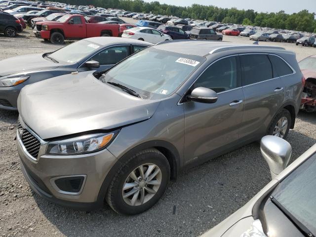 KIA SORENTO LX 2016 with VIN 5XYPGDA59GG009764 - Photo from auction