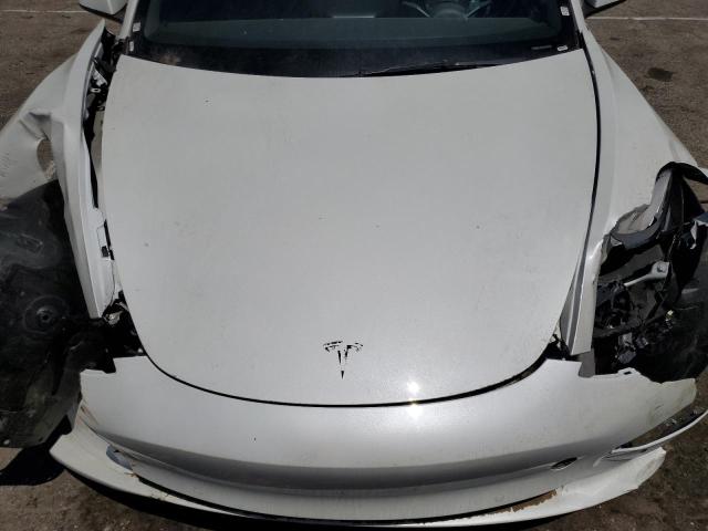 Photo 11 from auction – 2022 TESLA MODEL 3 with VIN 5YJ3E1EAXNF290102