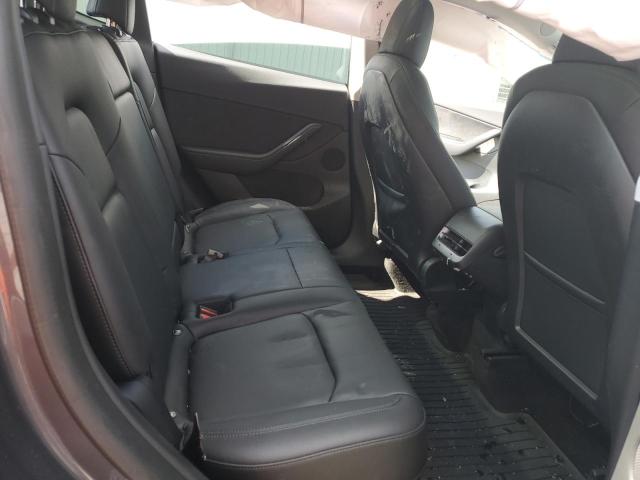 Photo 11 from auction – 2022 TESLA MODEL Y with VIN 7SAYGDEE1NF399779