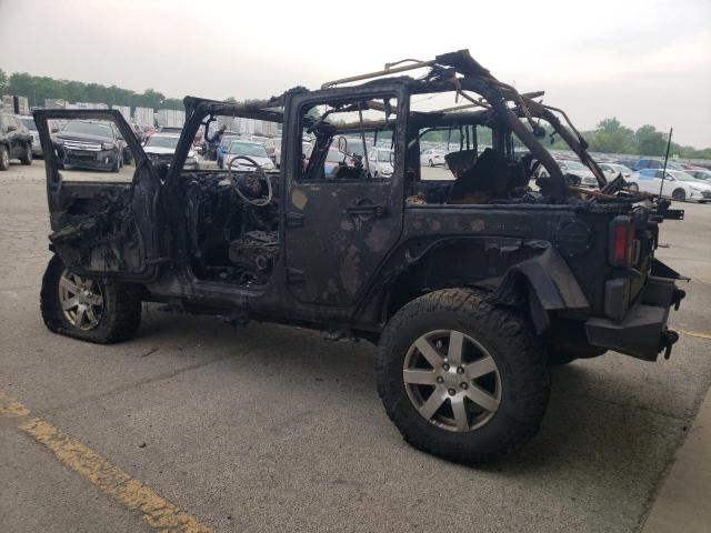Photo 2 from auction – 2011 JEEP WRANGLER U with VIN 1J4BA5H15BL625554