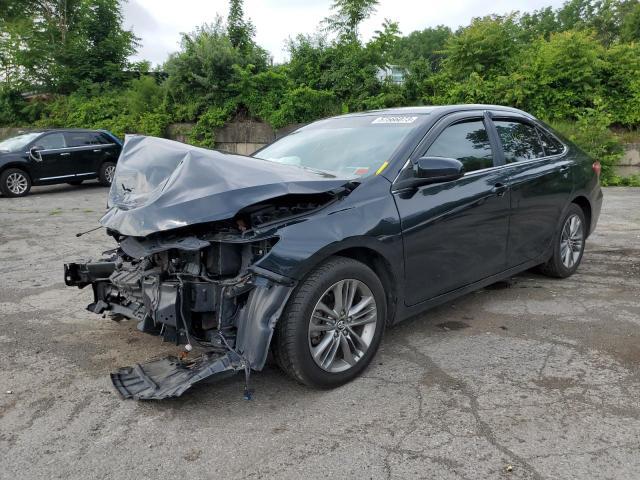 TOYOTA CAMRY LE 2017 with VIN 4T1BF1FKXHU426784 - Photo from auction