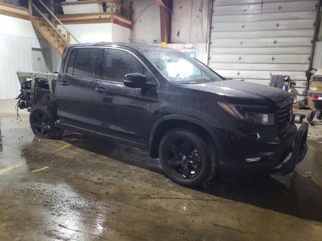 Photo 4 from auction – 2022 HONDA RIDGELINE with VIN 5FPYK3F84NB026578